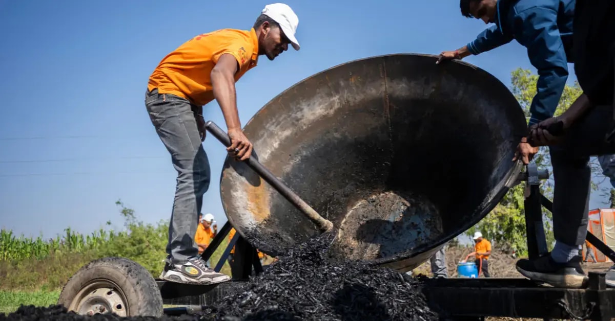 Farmers converting crop residue into biochar